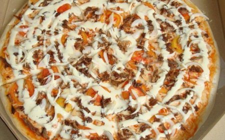 This Pepperoni Pizza Is Breaking the Internet in Qatar – Find Out Why!